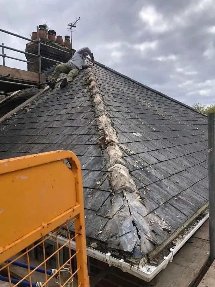 Slate roof ridge and chimney repair in Ottery St Mary